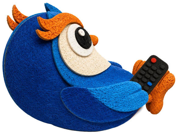 Owl lounging on a paper cushion, clicking the TV remote